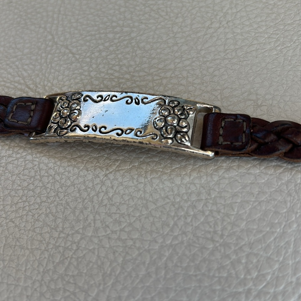 Bracelet- silver tone with braided leather band